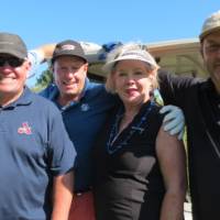 Posing in front of golf cart